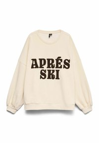 Kreemivärvi dressipluus langevate õlgade, elastsete mansettide ja tumedat pruunis reljeefse kirjaga "APRÉS SKI". Pehme tekstuur.