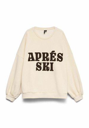 Krémově zbarvená mikina s nízkými rameny, elastickými manžetami a nápisem "APRÉS SKI" ve zvýšených tmavě hnědých písmenech. Měkká struktura.