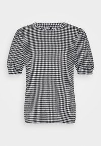 Černobílý top s houndstooth vzorem, krátkými puffovými rukávy a kulatým výstřihem, vyrobený z lehké tkaniny.