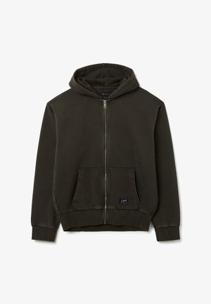 Dunkelgrüne Zip-Hoodie aus weichem Stoff, mit einer Vorderaschentasche, Kapuze und gerippten Bündchen. Minimalistisches Design mit einem Etikett.