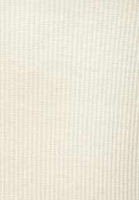Ribbed, cream-colored textile with a soft, textured surface. The design features evenly spaced vertical lines.