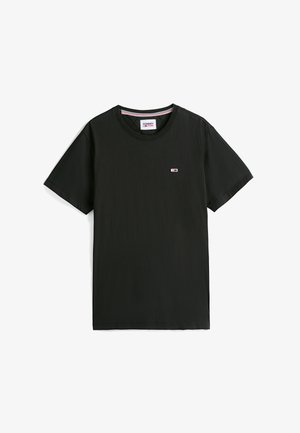 Zwarte katoenen T-shirt met korte mouwen, ronde hals en een klein logo-patch op de borst. Gladde textuur, comfortabele pasvorm.