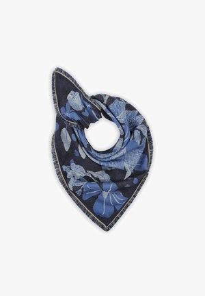 Blue floral scarf in various shades of blue, tied in a loop, with fringed edges and a dark background to highlight the design.