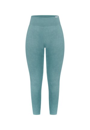 Leggings teal a vita alta con una texture liscia, dotati di una fascia in costina e dettagli di contorno sottili lungo i lati.