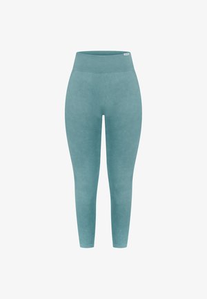 Türkise High-Waist-Leggings mit glatter Textur, ausgestattet mit einem gerippten Bund und dezenten Konturdetails an den Seiten.