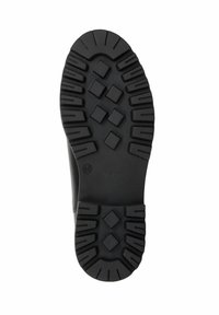 Czarna gumowa podeszwa z textured tread z prostokątnymi i diamentowymi wzorami. Rozmiar 36 oznaczony z boku.