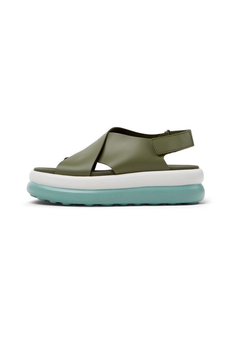 Olive green sandal with cross strap design, adjustable back strap, white midsole, and light blue base. Textured sole for grip.