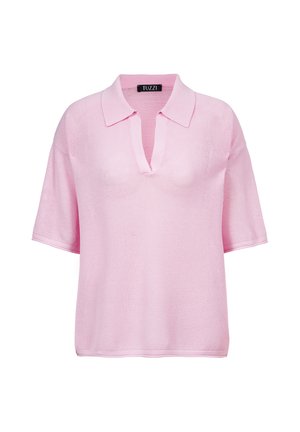 Light pink short-sleeve knit top with a collar and a V-shaped neckline, loose fit and textured fabric.