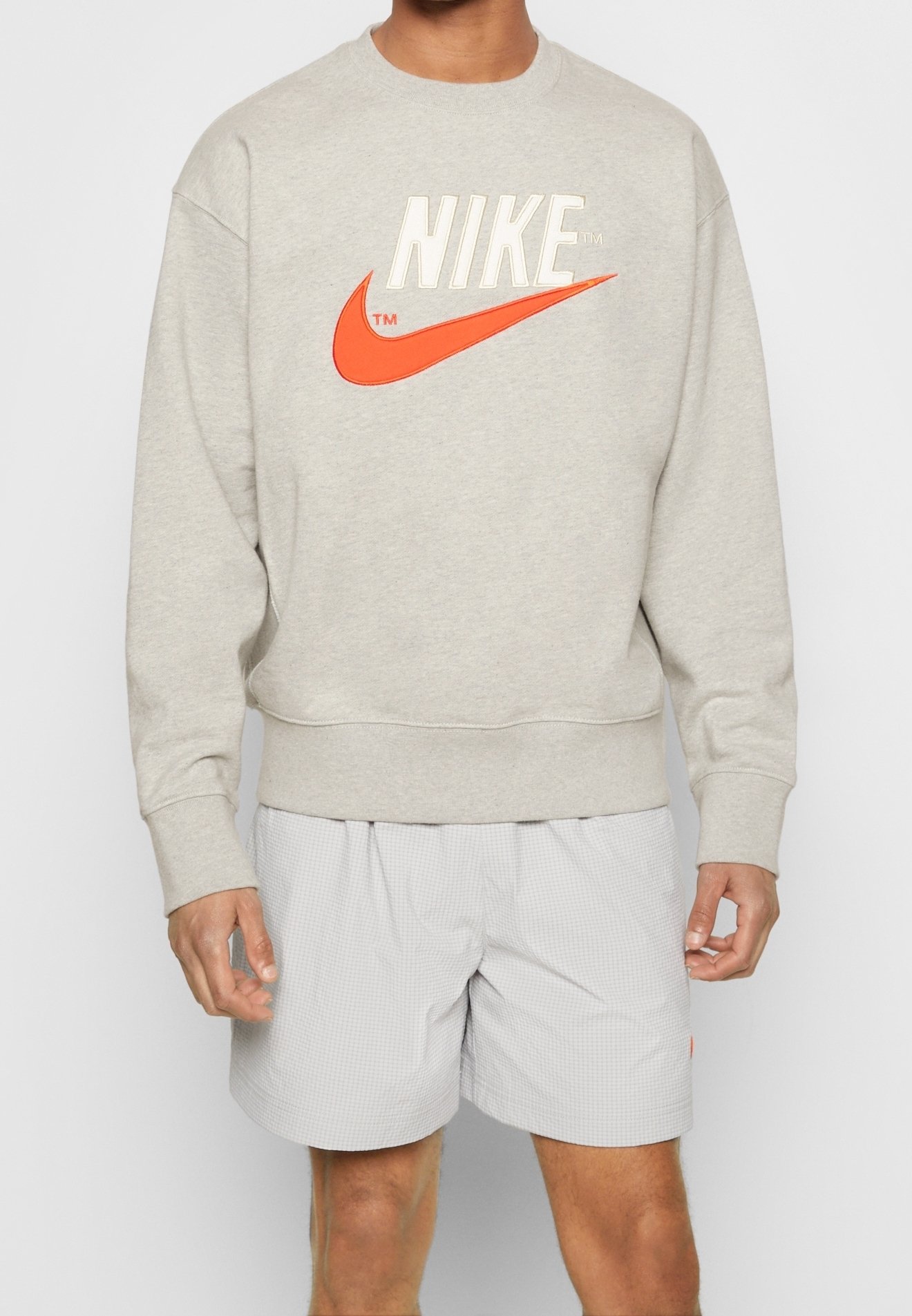 grey and orange nike sweatshirt