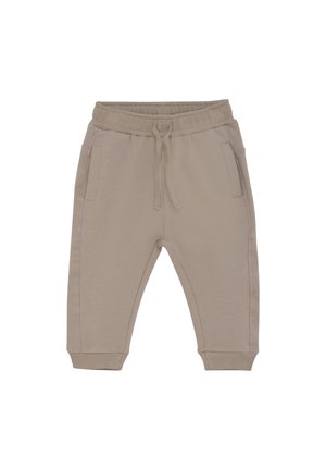 Hellbeige Jogginghosen aus weichem Material, mit einem elastischen Bund und Zugband, zwei Seitentaschen und eng anliegenden Bündchen.