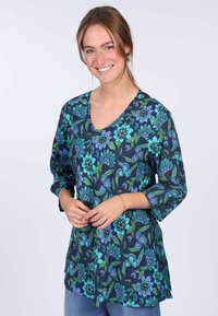 Floral tunic in dark navy with vibrant blue and green flower patterns, soft fabric, v-neck, and three-quarter sleeves.