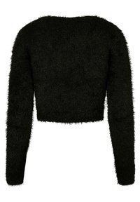 Maglione nero, corto, con maniche lunghe, realizzato in un morbido tessuto peloso. Presenta un colletto rotondo semplice e una superficie testurizzata.
