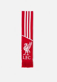 Șal roșu și alb cu emblema Liverpool FC, având o pasăre Liver și trei dungi verticale, terminat cu ciucuri roșii.