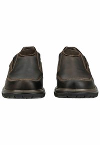 Braune Lederschuhe mit gestickten Details, runder Zehenform und strukturieller Gummisohle. Rutschfestes Design mit niedrigem Profil und minimalen Beschlägen.
