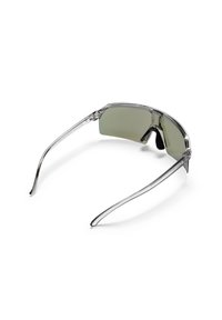 Γυαλιά ηλίου με διαυγή, ελαφρύ σκελετό, φακούς με πράσινη απόχρωση, αεροδυναμικό σχεδιασμό και κομψά μπράτσα για μοντέρνα εμφάνιση.