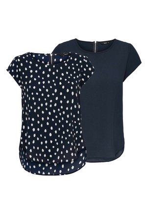Zwei Damenoberteile: das eine marineblau mit weißen Punkten, das andere einfarbig marineblau. Beide haben kurze Ärmel und einen abgerundeten Saum.