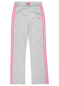 Šedé tepláky s růžovými bočními pruhy, s elastickým pasem a šňůrkou na stažení. Růžové logo Adidas v horním levém rohu.