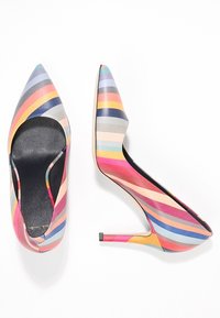 Multicolored high-heeled shoes feature a pointed toe and a slim stiletto heel. The upper has horizontal stripes in various colors.