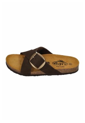 Brown sandal with wide leather straps crossing over foot, large metallic buckle, cork sole, and a tan footbed with "Plakton" logo.