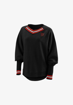 Sweat-shirt noir à manches longues avec manches ballon, col en V rayé rouge-blanc-noir et poignets, et "W" rouge brodé sur la poitrine gauche.
