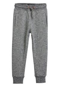 Graue Jogginghosen aus strukturiertem Stoff, mit elastischem Bund und Kordelzug, Seitentaschen und Bündchen an den Knöcheln.
