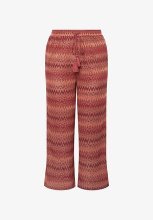 Røde zigzag-mønstret bukser med elastisk talje og dekorative kvaster, lavet af et blødt, let stof. Udfoldet ben-design.