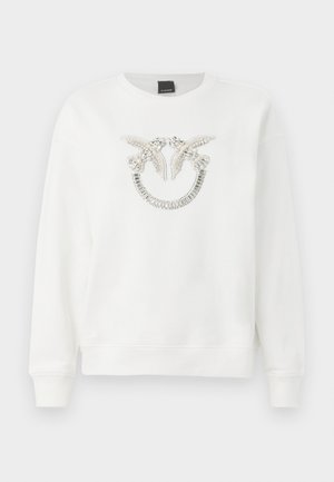 Felpa bianca con scollo rotondo e maniche lunghe. Presenta dettagli in argento e perle decorati con un design simmetrico sul davanti.