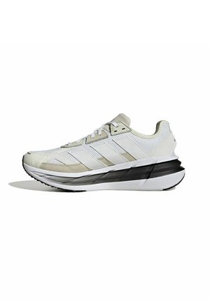 Scarpe da corsa leggere con tomaia in mesh bianco con dettagli beige, suola spessa nera e design elegante e sagomato.