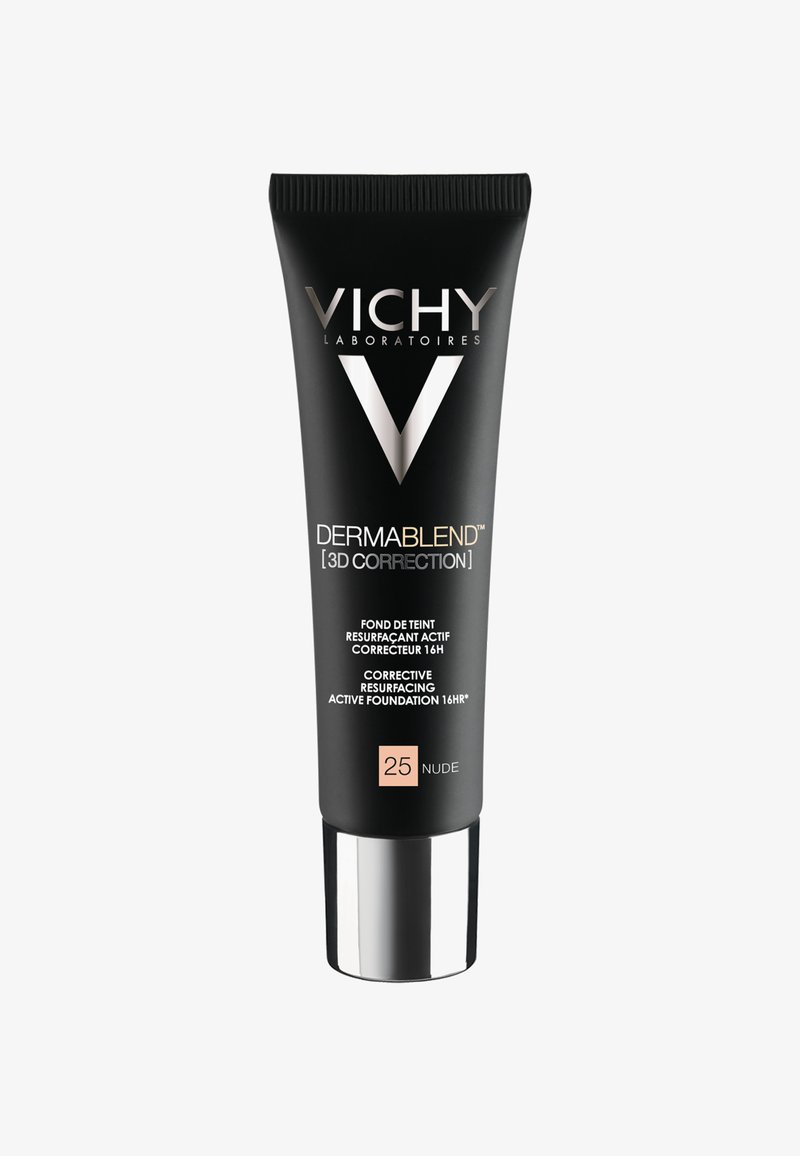 Black squeeze tube with silver cap. Features "Vichy" logo and product name in white and gold text. Label identifies shade "25 Nude."