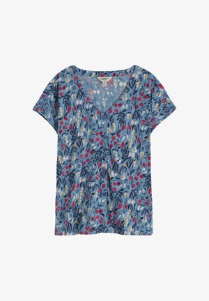 Zila īsroku V-veida kakla blūze ar daudzkrāsainu ziedu rakstu un pogu detaļām priekšpusē.