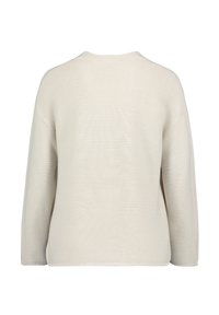 Hellbeiger Pullover mit gerippter Textur, weiten Ärmeln und runder Ausschnitt. Der Rücken hat ein einfaches, nahtloses Design.