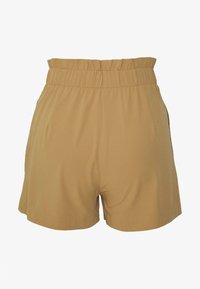 Pantaloni cargo color khaki con vestibilità ampia, vita elasticizzata e tasche laterali, dotati di una texture liscia e un design semplice e funzionale.