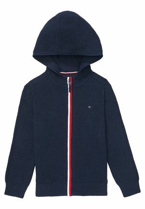 Navy blauwe gebreide zip-up hoodie met rood-witte ritssluitingafwerking en klein logo links op de borst, met lange mouwen en geribde boorden en zoom.