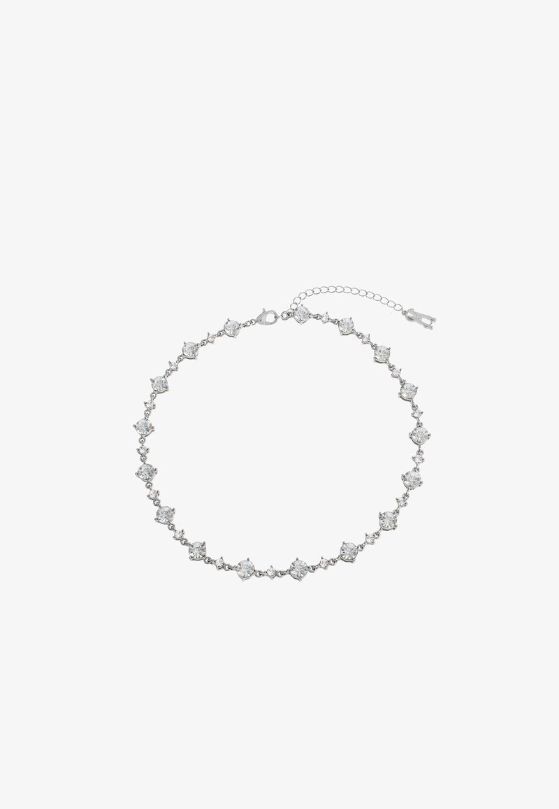 Silver-tone bracelet featuring circular clear crystals set in a repeating geometric pattern with a clasp and adjustable chain extension.