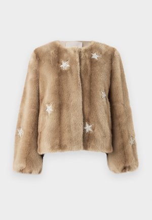 Faux fur jacket in beige with a cropped design. Features silver star embellishments and soft texture. No visible fastenings.