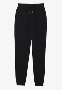 Pantalons de survêtement noirs en tissu doux. Caractéristiques : une taille élastique avec cordon de serrage, des poches latérales et des poignets ajustés aux chevilles.