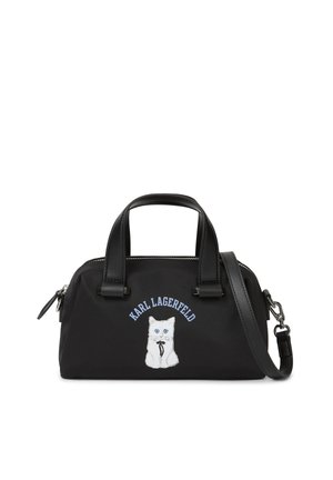Black handbag with top handles and shoulder strap, featuring a white cat illustration and "Karl Lagerfeld" text above.