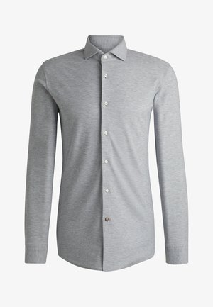 Light gray long-sleeve shirt made of soft fabric, featuring a button-down front with white buttons and a structured collar.
