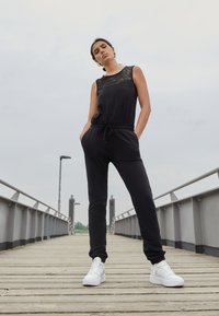 Urban Classics - LADIES BLOCK - Jumpsuit - black Thumbnail-Bild 1