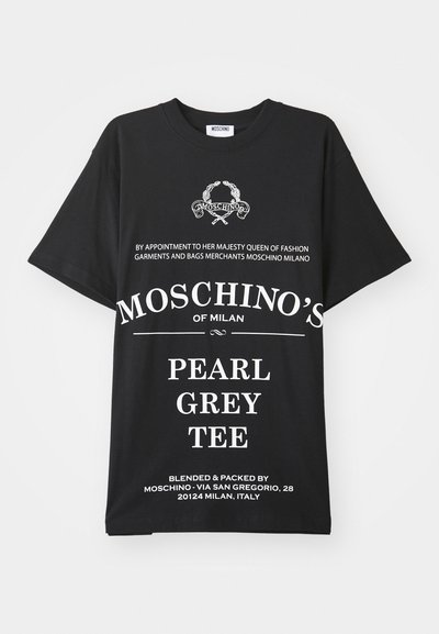 Black cotton t-shirt featuring bold white text. Notable details include a logo and various printed text in different fonts and sizes.