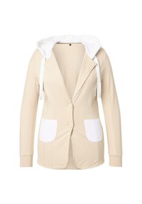 Beige blazer, jossa on pehmeä valkoinen huppu, edestä napitus ja kaksi valkoista taskua. Valmistettu strukturoidusta materiaalista, jossa on istuva leikkaus.