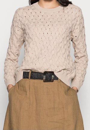 Stickad tröja - beige