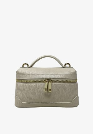 Light beige leather bag with a textured surface, gold zipper closure, top handle, and rounded corners. Gold hardware accents visible.