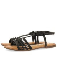 Sandalias de cuero trenzado negro con un diseño de punta abierta, correa ajustable en el tobillo y una suela plana marrón con detalles trenzados.