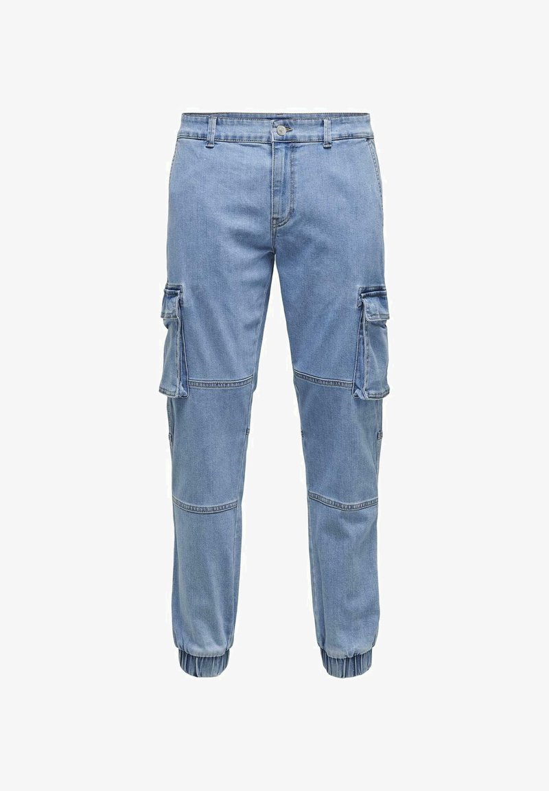 Light blue cargo pants made of denim, featuring side pockets, elastic ankle cuffs, and stitched panel details.