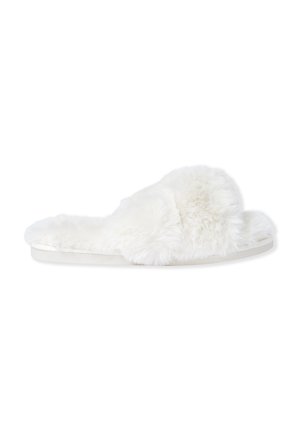 Pantofole bianche in pelliccia con suola piatta, caratterizzate da una texture morbida e un design superiore soffice. Struttura semplice e senza cuciture, priva di ulteriori dettagli.