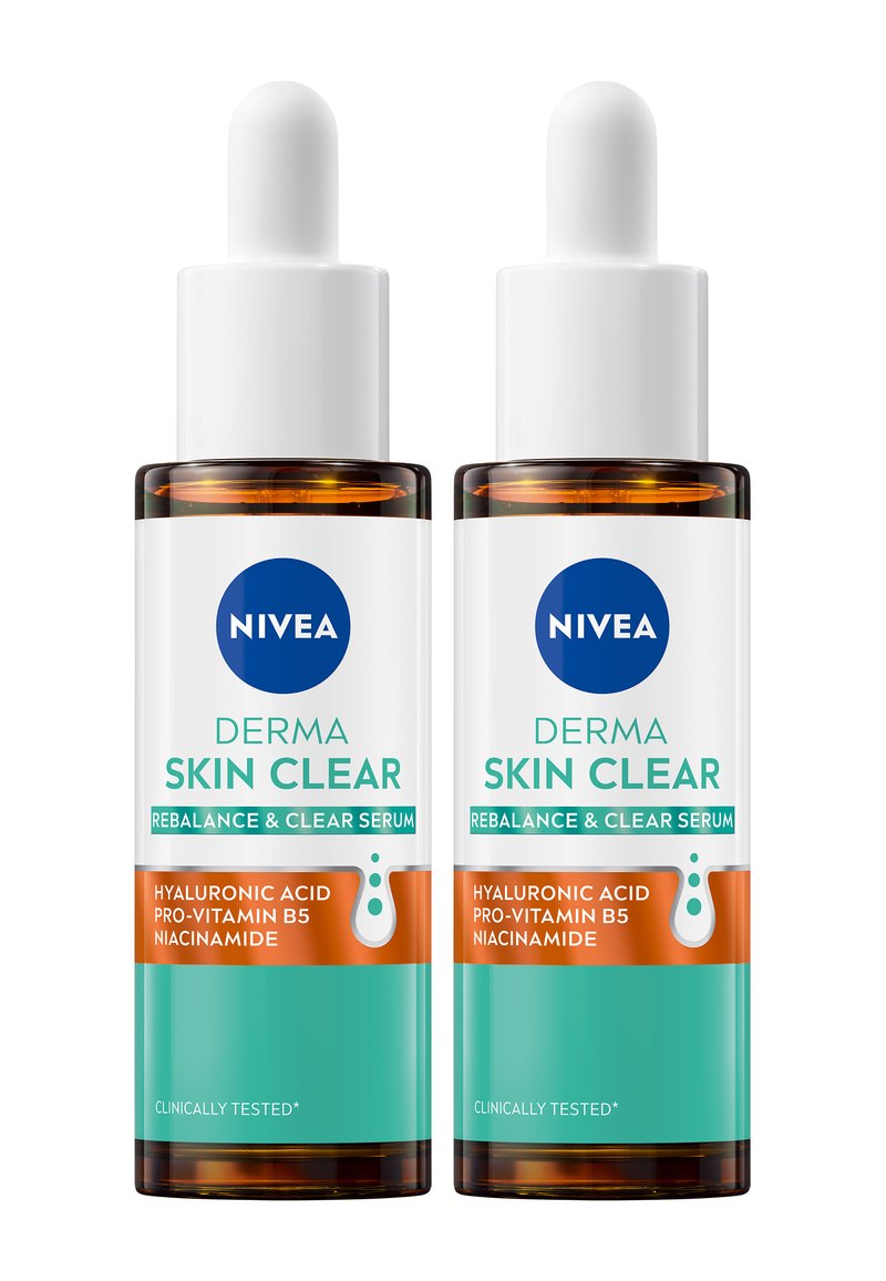 Two clear glass bottles of NIVEA Derma Skin Clear serum, featuring a white dropper and labels in blue and orange, highlighting key ingredients.