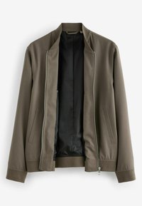 Olivgrüne Bomberjacke. Sie verfügt über einen Reißverschluss, gerippte Bündchen und ein schwarz gefüttertes Innenleben mit glatter Textur.