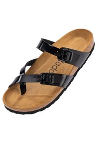 Sandal in pelle verniciata nera con due fibbie regolabili. Sottopiede in sughero e suola in gomma testurizzata. Design a cinturini incrociati.