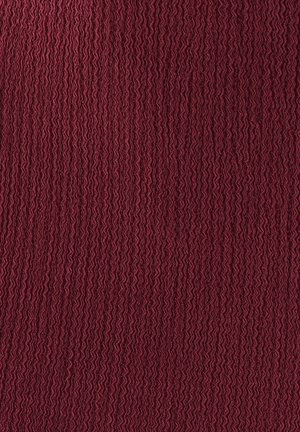 Burgundy textured fabric with a wavy pattern, featuring a soft and slightly crinkled surface, ideal for upholstery or garments.